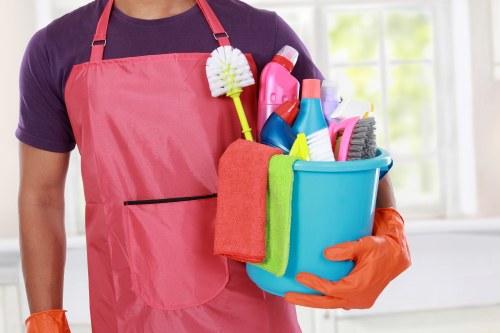 Technician treating mattress stains during a local cleaning appointment